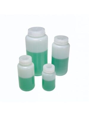 Set of plastic bottles filled with green liquid, varying in size.