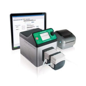 A compact label printing system with a touchscreen interface and a connected monitor.